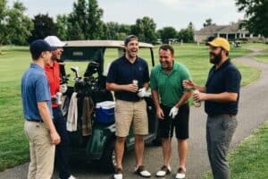 Young Golfers Laughing Loudly at a Golf Course