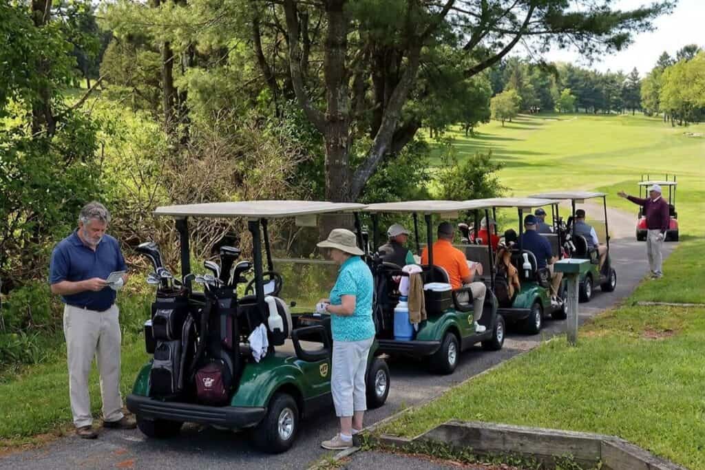 Golfers Queueing on a Crowded Backed Up Golf Course
